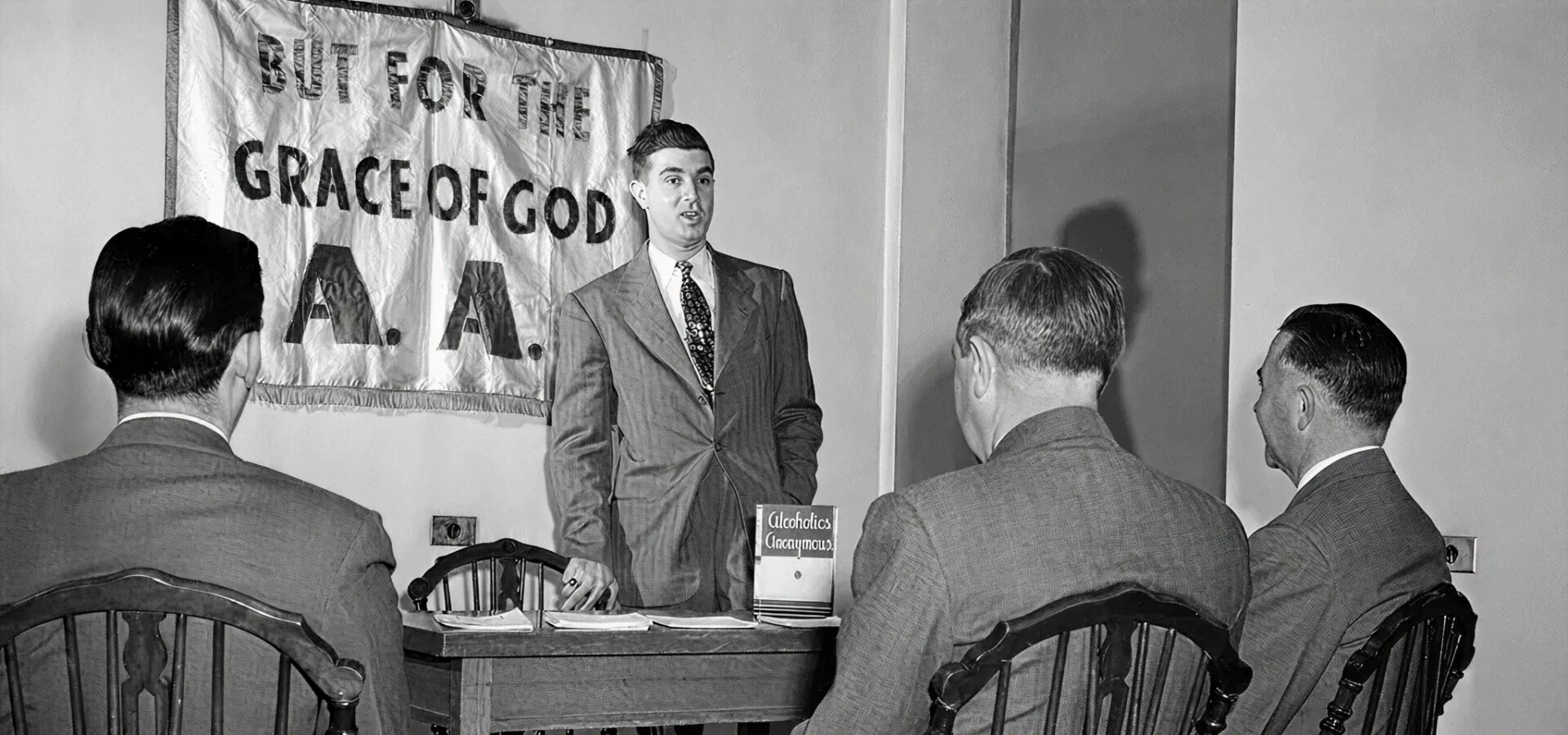 Man speaking at AA meeting