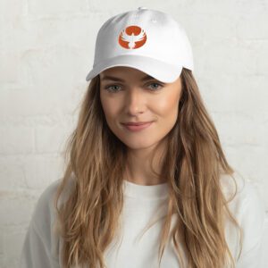 Smiling woman wearing white cap with orange logo