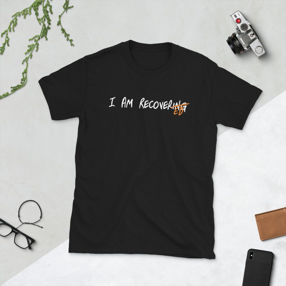 Black T-shirt saying I AM RECOVERING