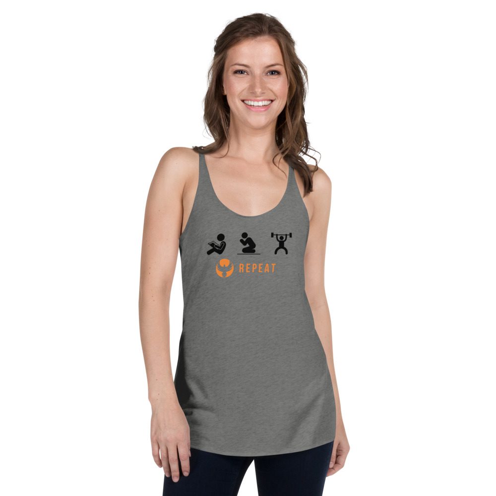 Smiling woman wearing gray workout tank top