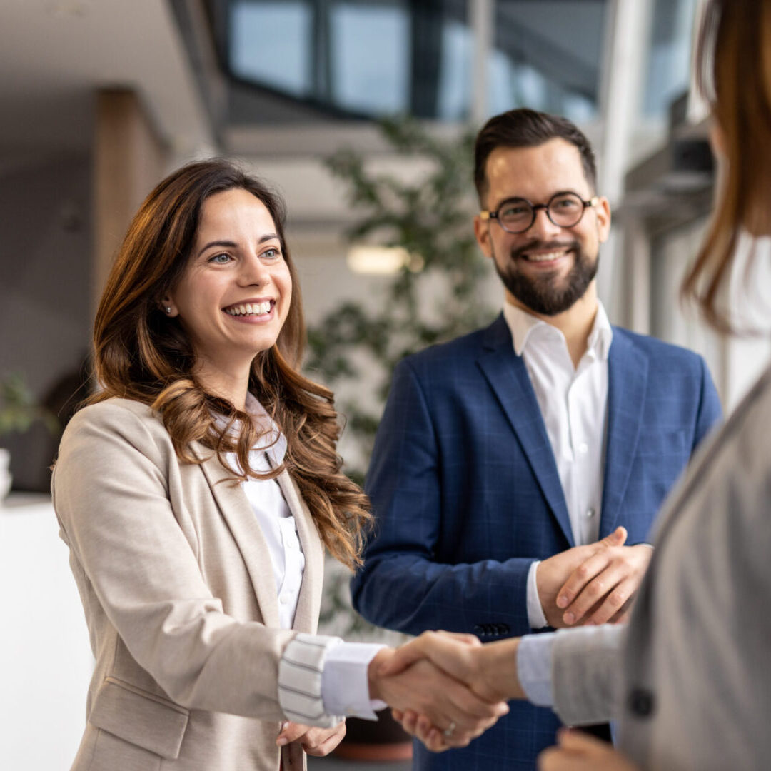 Colleagues greeting each other